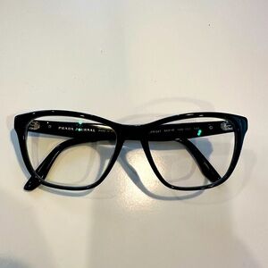 Prada Journal black eyeglasses frames.